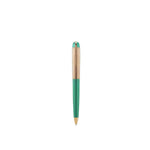 Green pen with gold accents on a white background