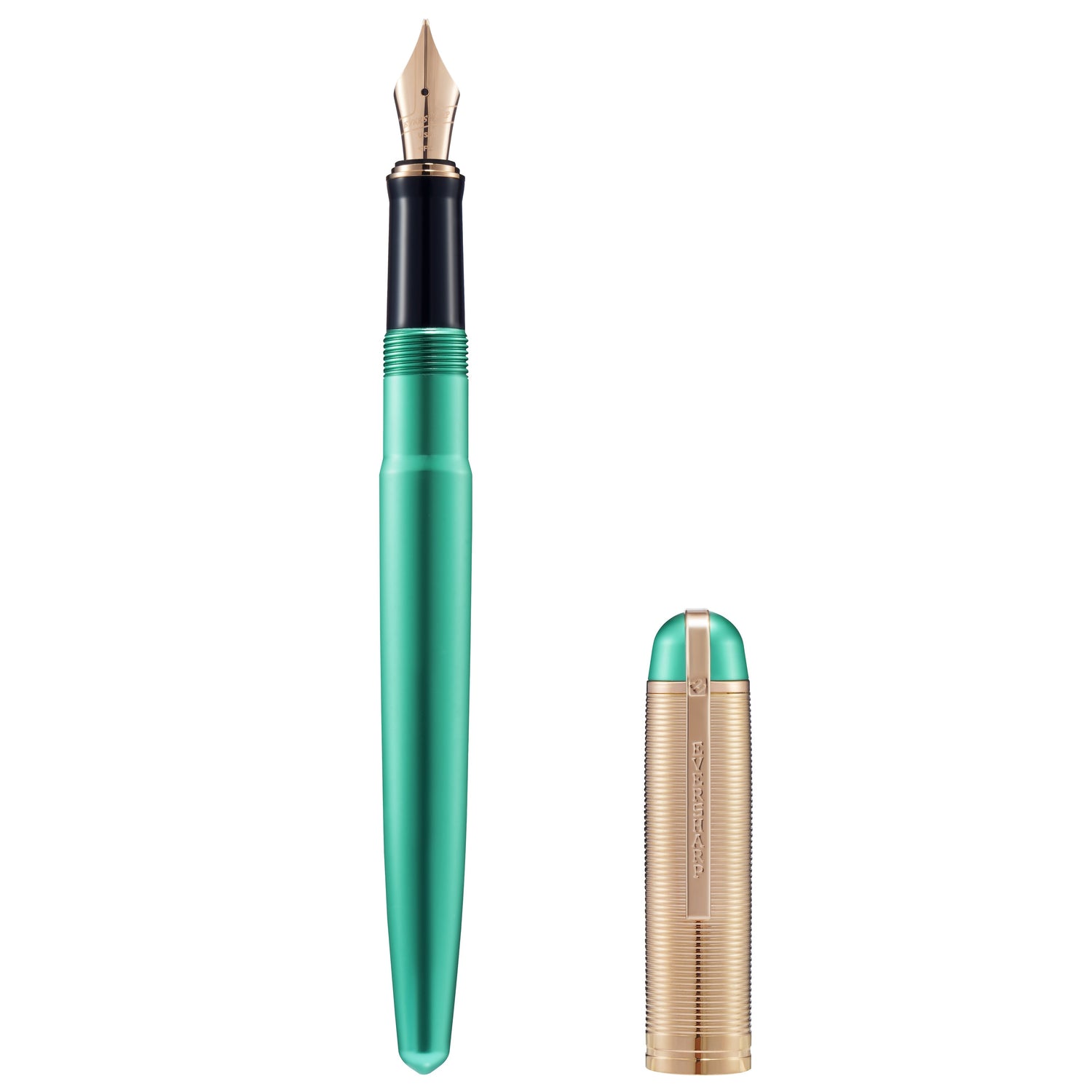 Green fountain pen with gold cap on a white background